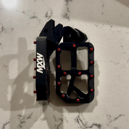 Black foot pegs