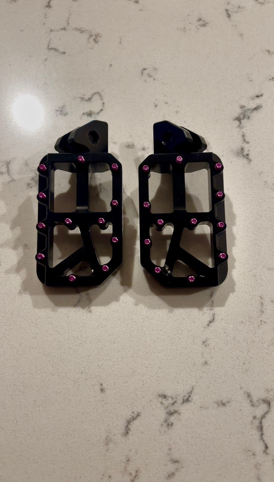 Black foot pegs