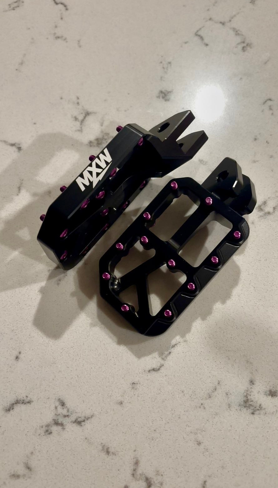 Black foot pegs
