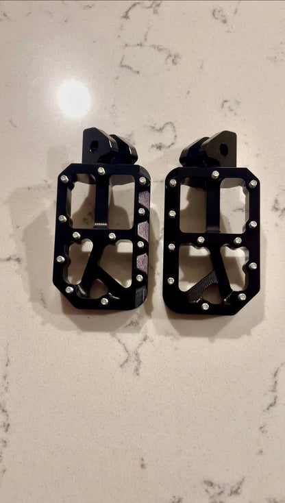 Black foot pegs