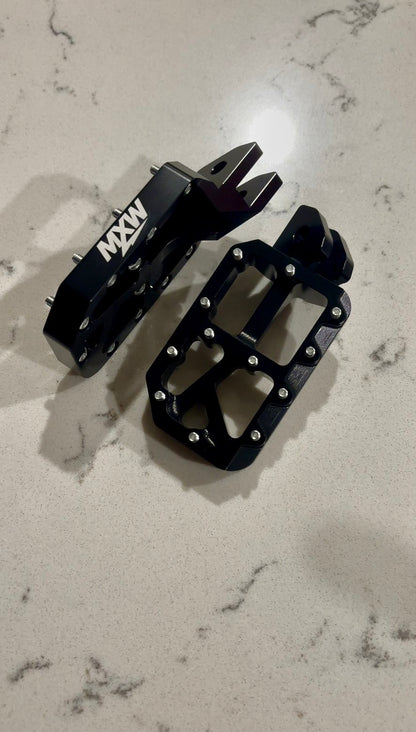Black foot pegs