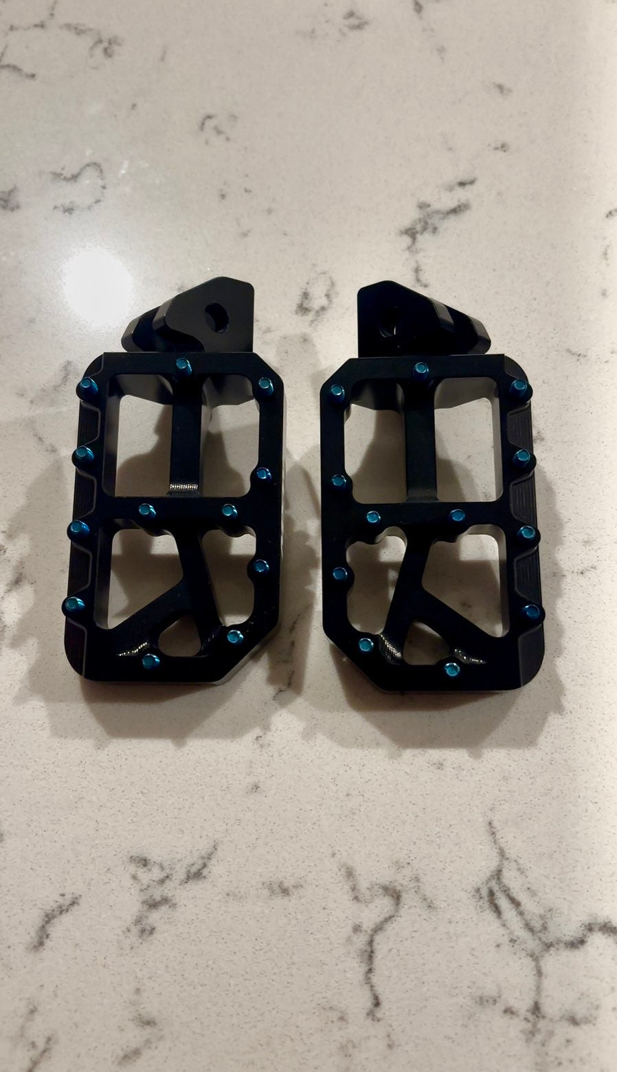 Black foot pegs