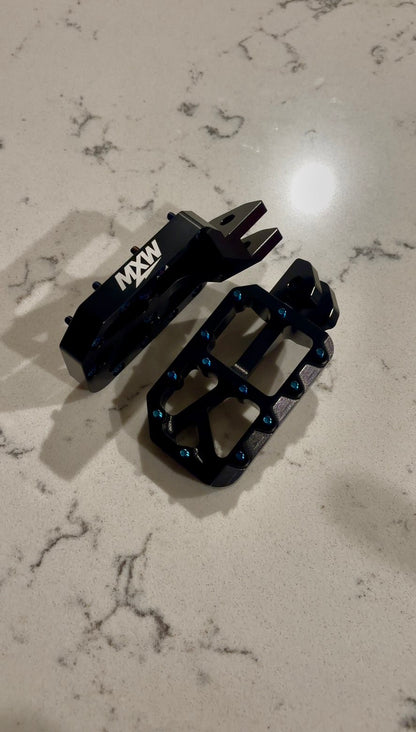 Black foot pegs