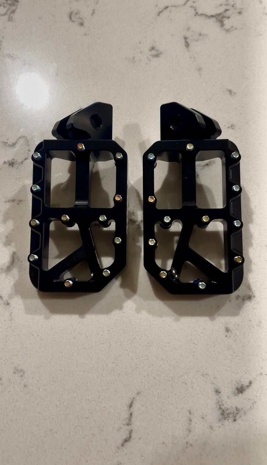 Black foot pegs
