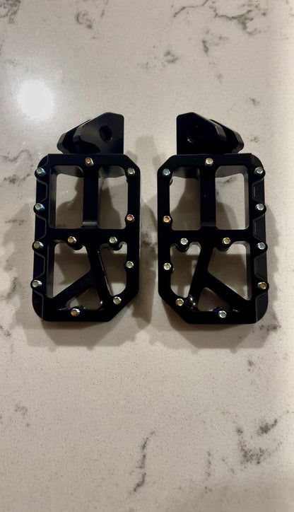 Black foot pegs
