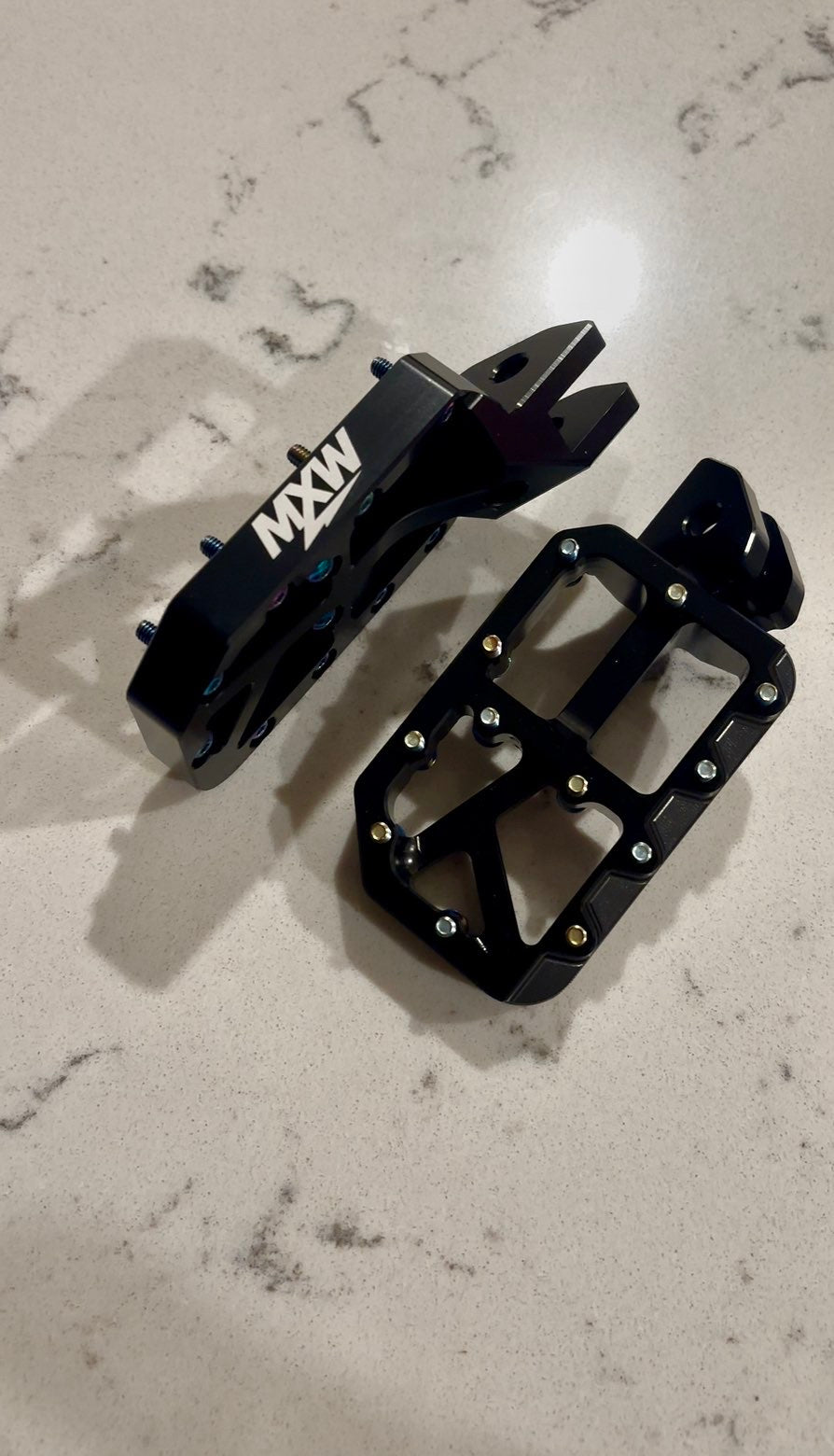 Black foot pegs
