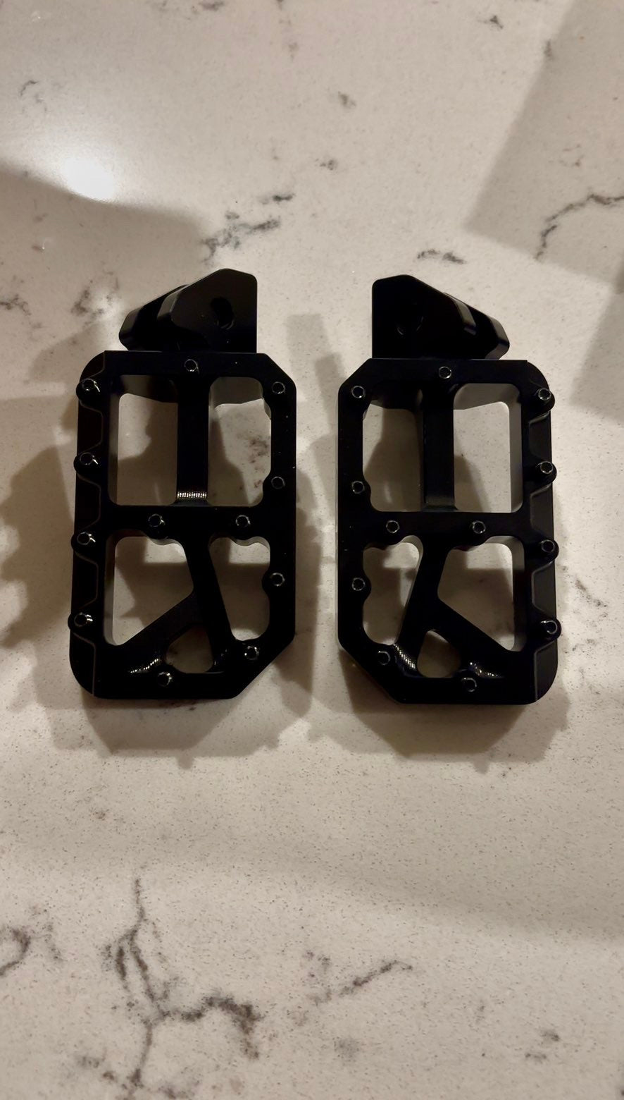 Black foot pegs