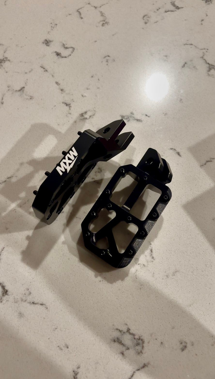 Black foot pegs