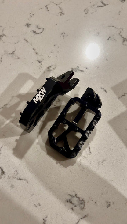Black foot pegs